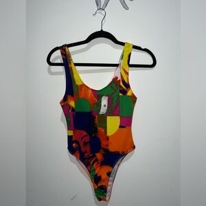 Colorful body suit. Soft. Brand new with tag
